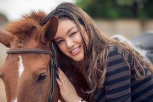 equine therapy student and a horse