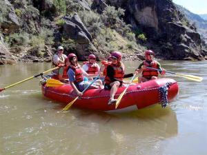 girls rafting on a river